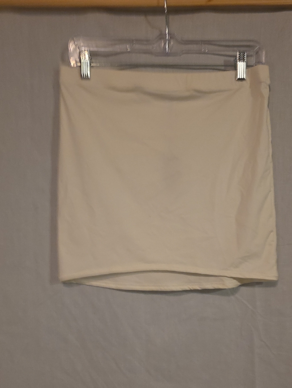 SKIMS Neutral Cream Fitted Mini Skirt